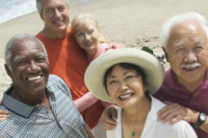 diverse group of seniors on the beach